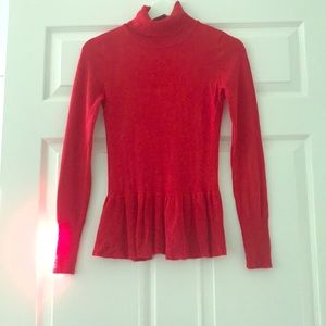 Beautiful turtleneck peplum sweater.